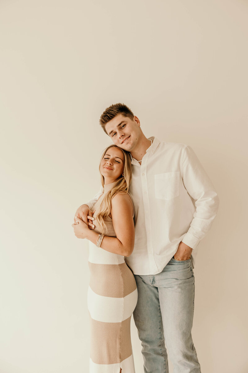 couple embracing during their nashville studio session