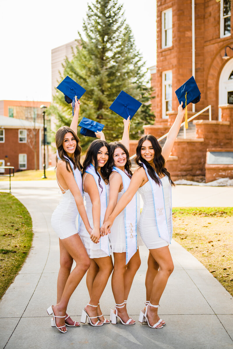 Julia Romano Photography NAU Northern Arizona University Flagstaff graduation sorority caps group girls Old Main