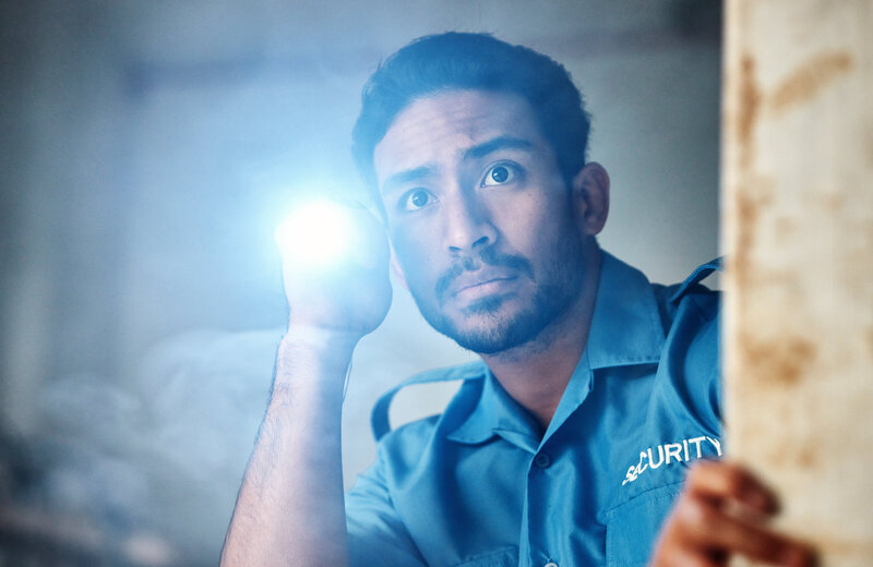 flashlight-security-guard-and-man-in-dark-room-fo-2023-11-27-05-19-38-utc