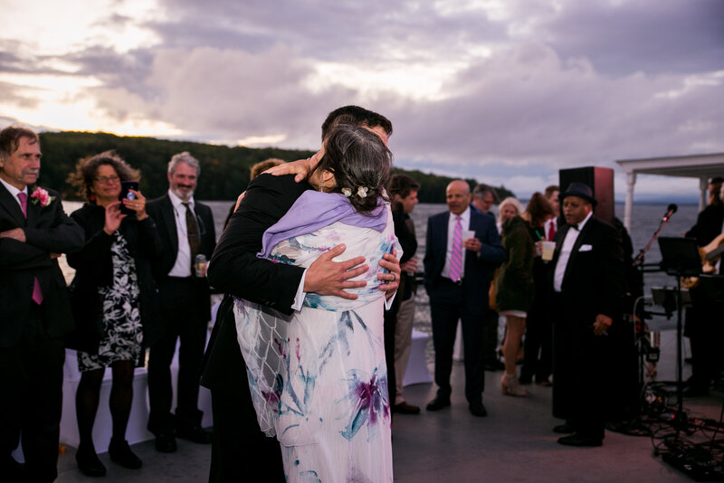 Groom hugging Mom | Wedding Photography taken by Maine Wedding Photographer