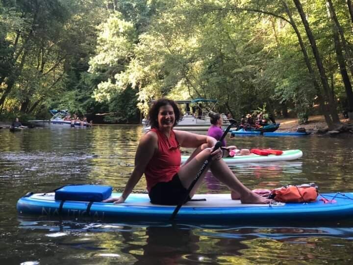 Jai Lee paddleboarding