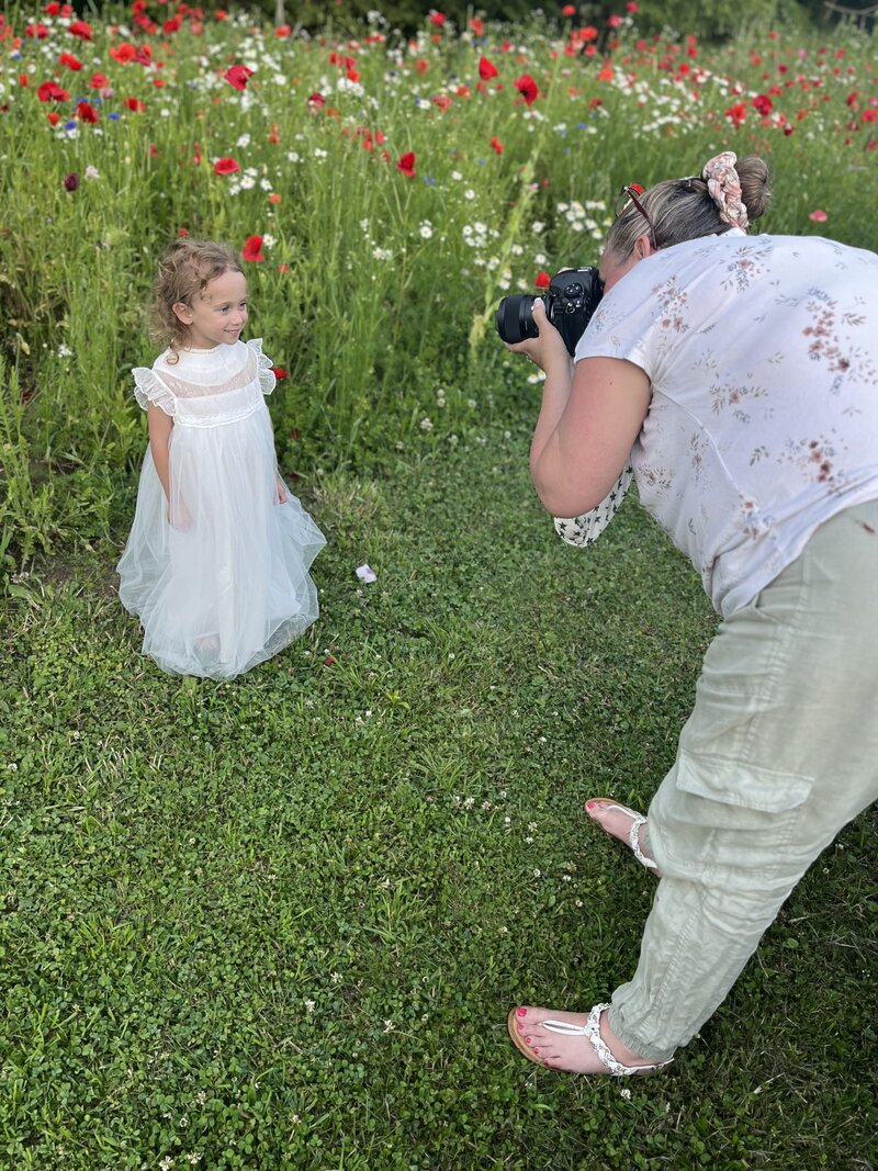 A joyful outdoor milestone session—capturing childhood wonder in full bloom.