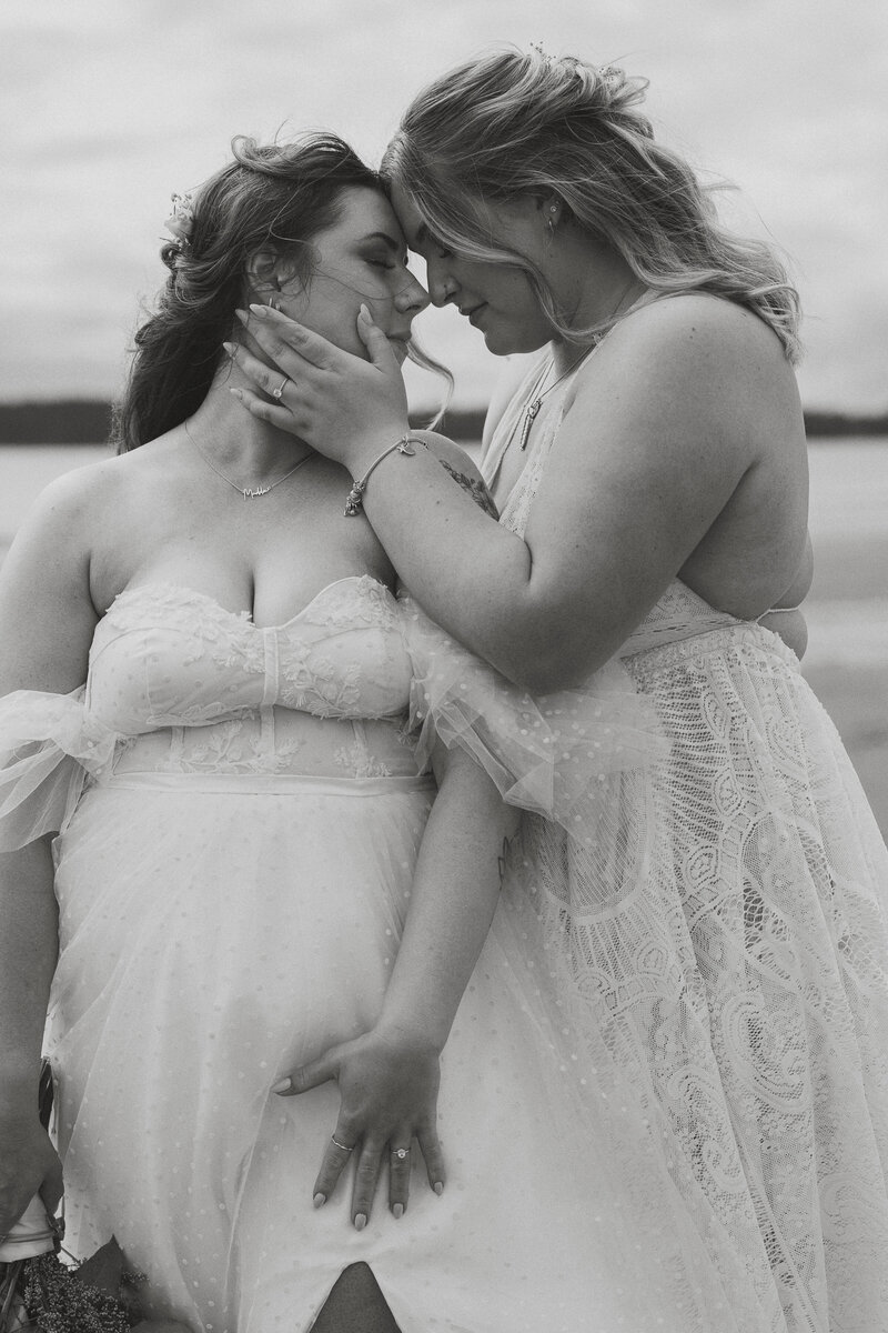 Brides nose to nose at Mackenzie Beach in Tofino by Latitude 49 Photography.