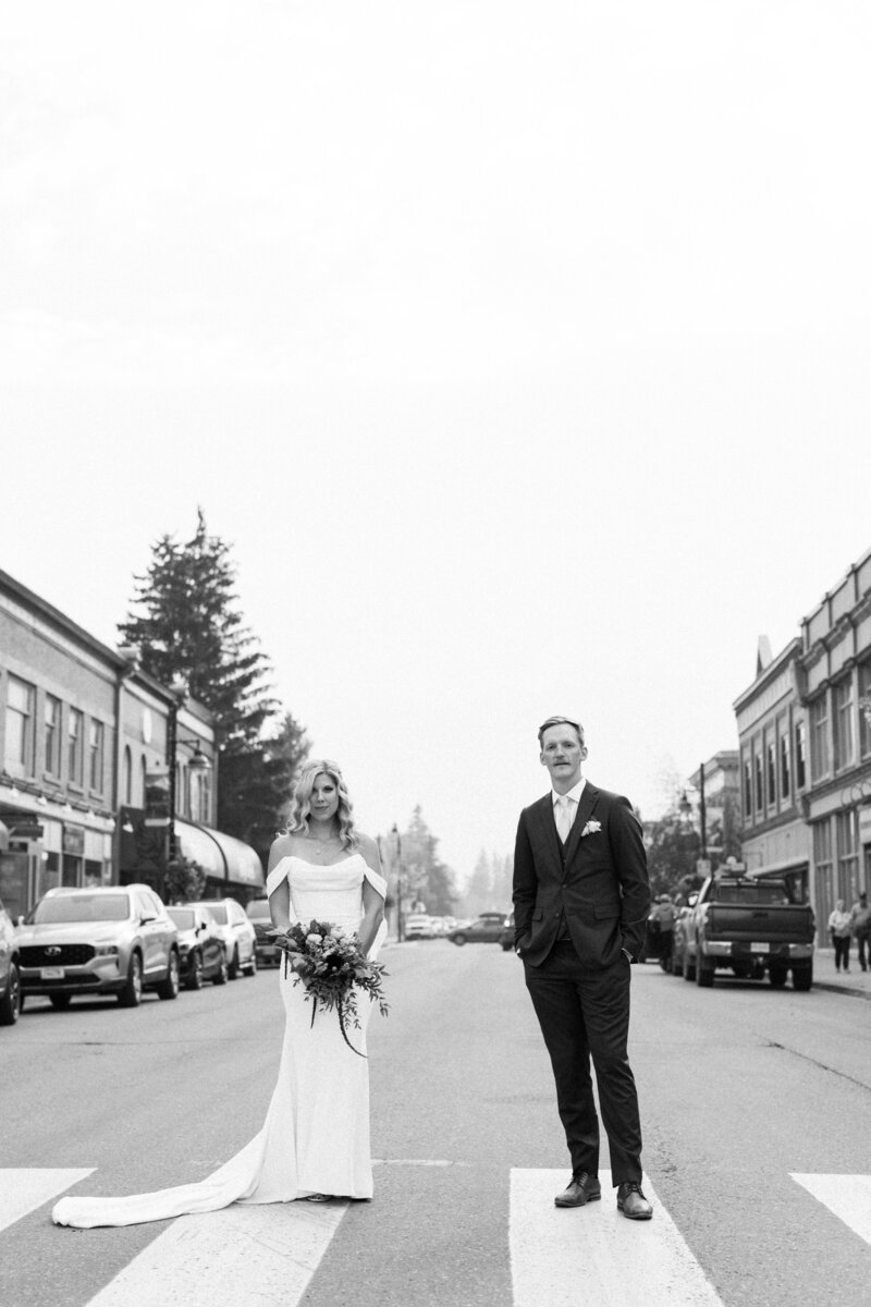 detail photo of bouquet and fernie couple holding hands captured by fernie wedding photographer