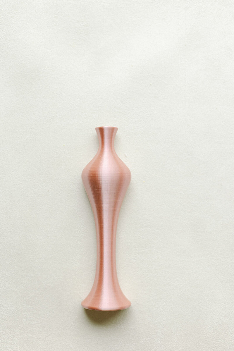 Miniature vases used as props in flat lay floral arrangements
