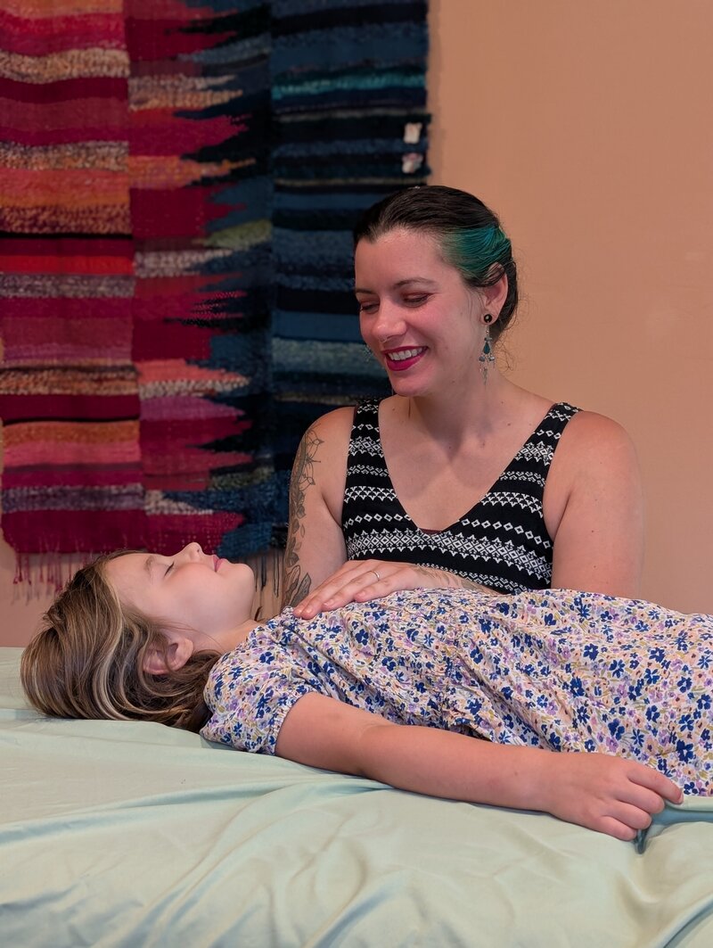 Julie & Child receiving Craniosacral Therapy in Ellicott City, Maryland. 