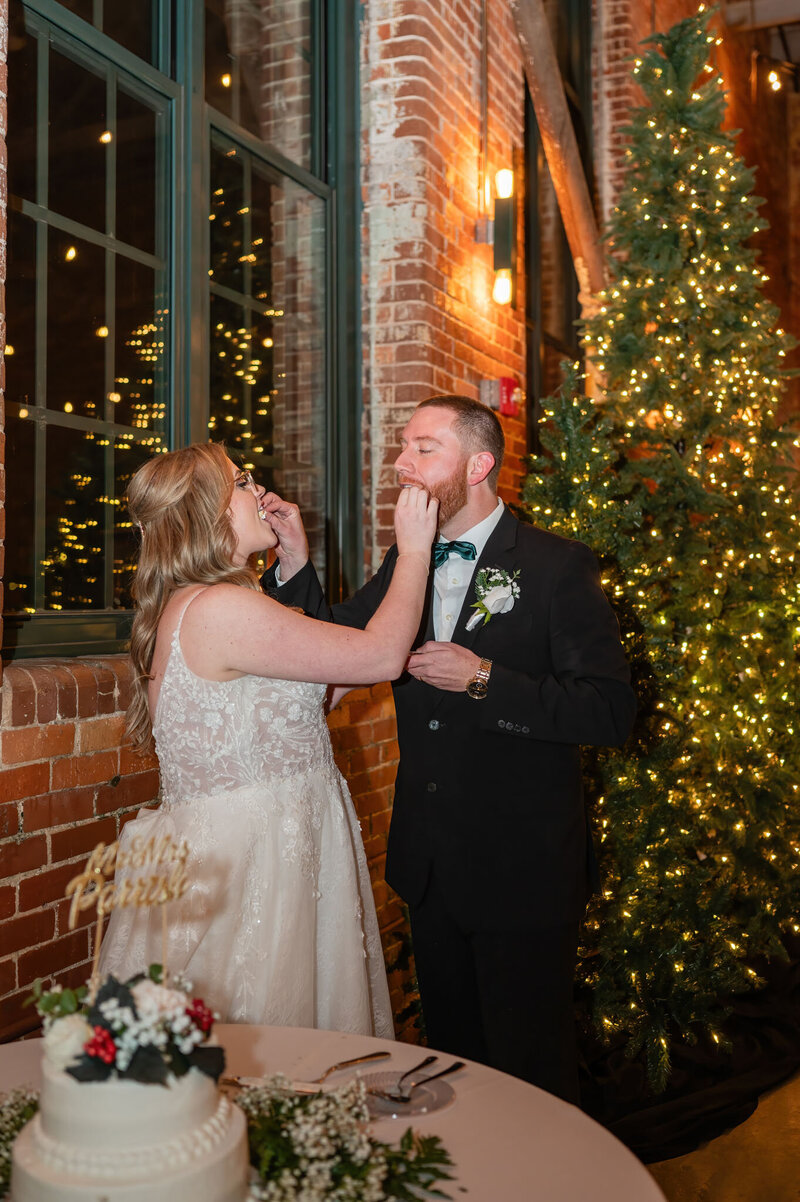 Couple feeding each other cake