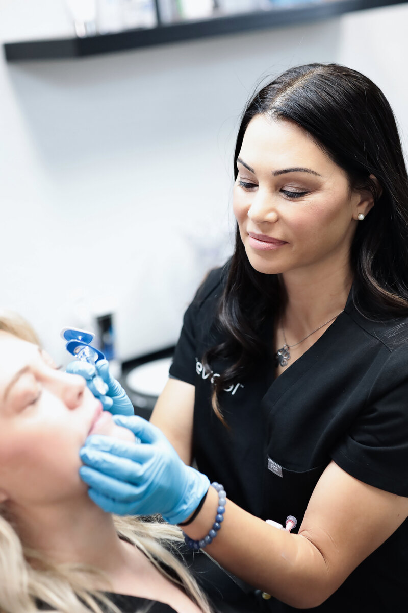 lady receiving botox at home