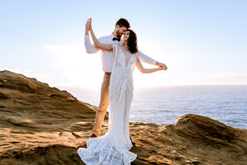 A bold bridal portrait capturing the raw, adventurous energy of desert landscapes under the Pacific Northwest sky.