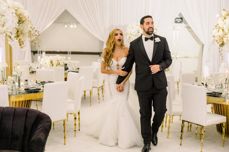 Bride and groom walk up memorial steps at their DC wedding