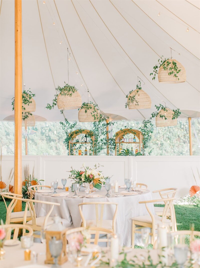 wedding reception tent with greenery
