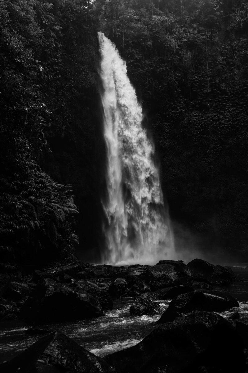 waterfall coming off of mountain