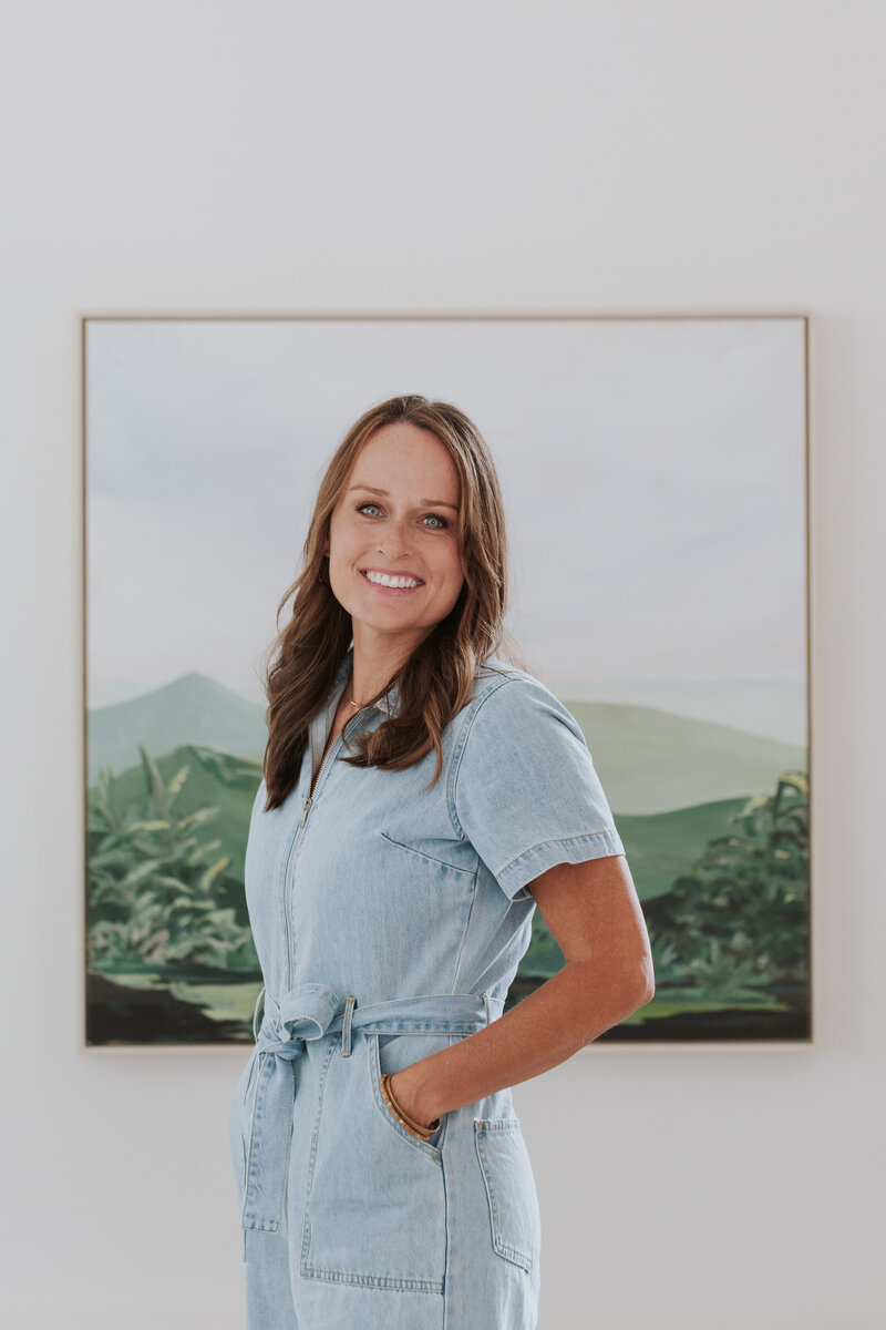 artist-portrait-with-framed-art-for-brand-session-south-charlotte