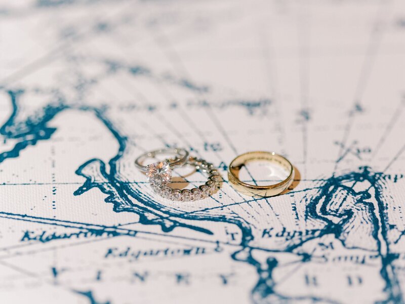 Wedding rings on blue and white map