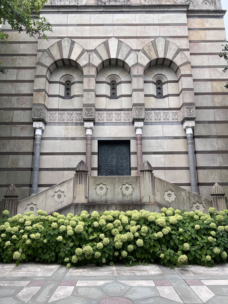 Architectural building with hydrangeas