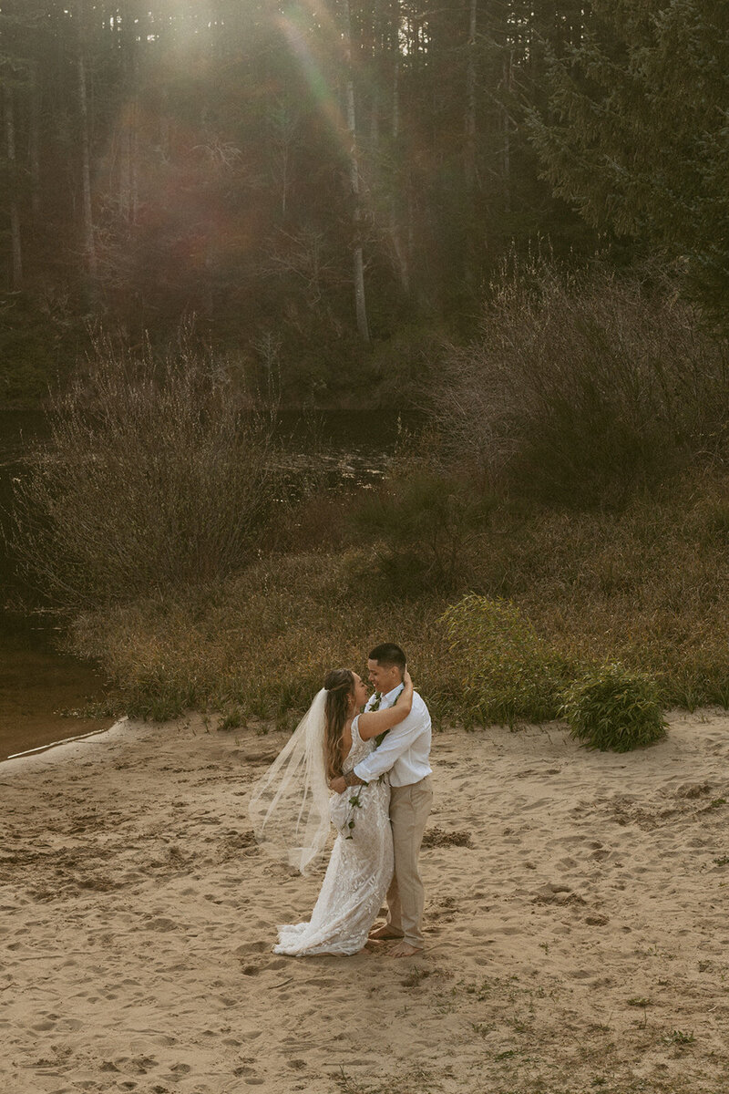 Kourtney and Sage dancing in forest on their elopement day