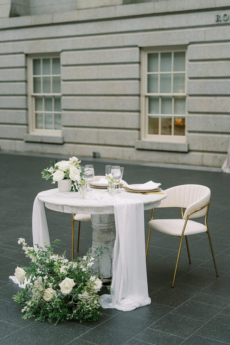Sweetheart table with white flowers