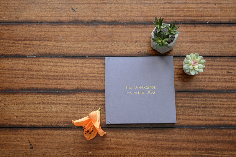 A colorful image of a custom photo album created by Pittsburgh photographer, Kristin Wieskamp.