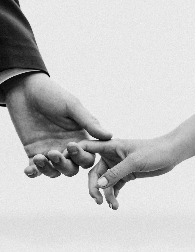 Bride and Groom Holding Hands