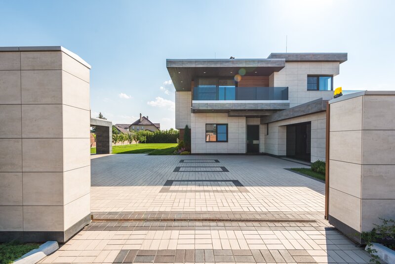 Home with driveway, garage, windows and door
