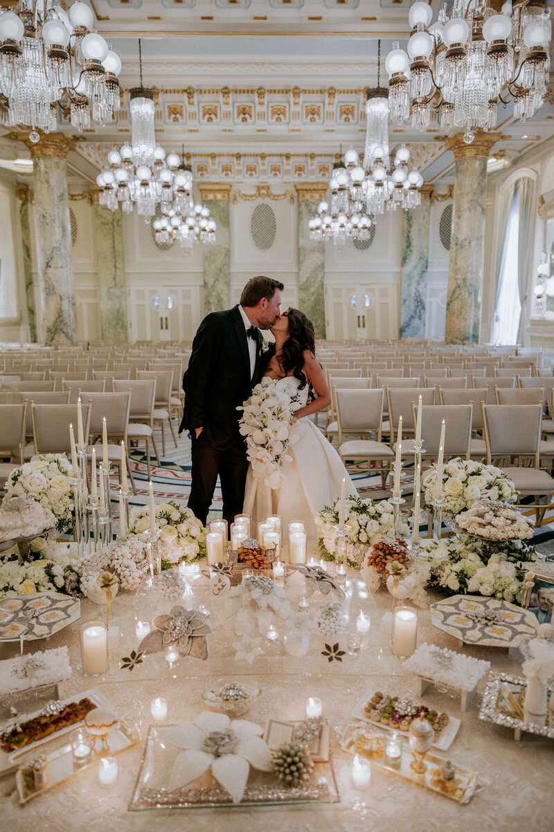persian-bride-and-groom-kissing-at-the-sofreh-aghd