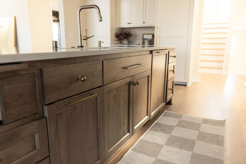 A NEW CONSTRUCTION HOME BUILT BY FATHER & SON HIRED OUR TEAM TO MAKE ALL THE INTERIOR SELECTIONS OF THEIR HOME. WE CHOSE LIGHTING, COLOR, HARD SURFACE MATERIAL, FURNISHINGS, TILE, AND MUCH MORE! WITH AMAZING CRAFTSMANSHIP, WE WERE ABLE TO CREATE A MODERN MISSION STYLE HOME THAT FEELS SPACIOUS, WELCOMING, AND BRIGHT.