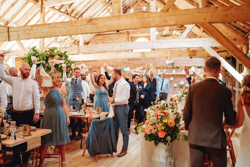 Wedding breakfast flowers at Haybarn Dulus