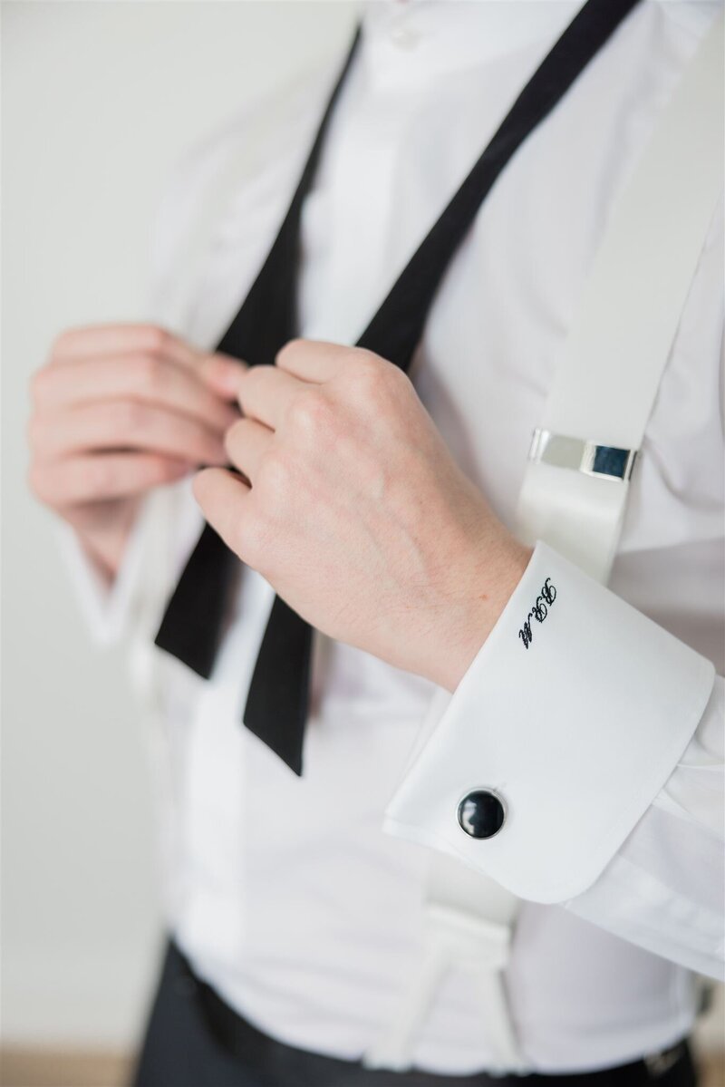 A closeup of the groom's bowtie before it's tied while he is getting dressed at the Alfond Inn, Winter Park. 