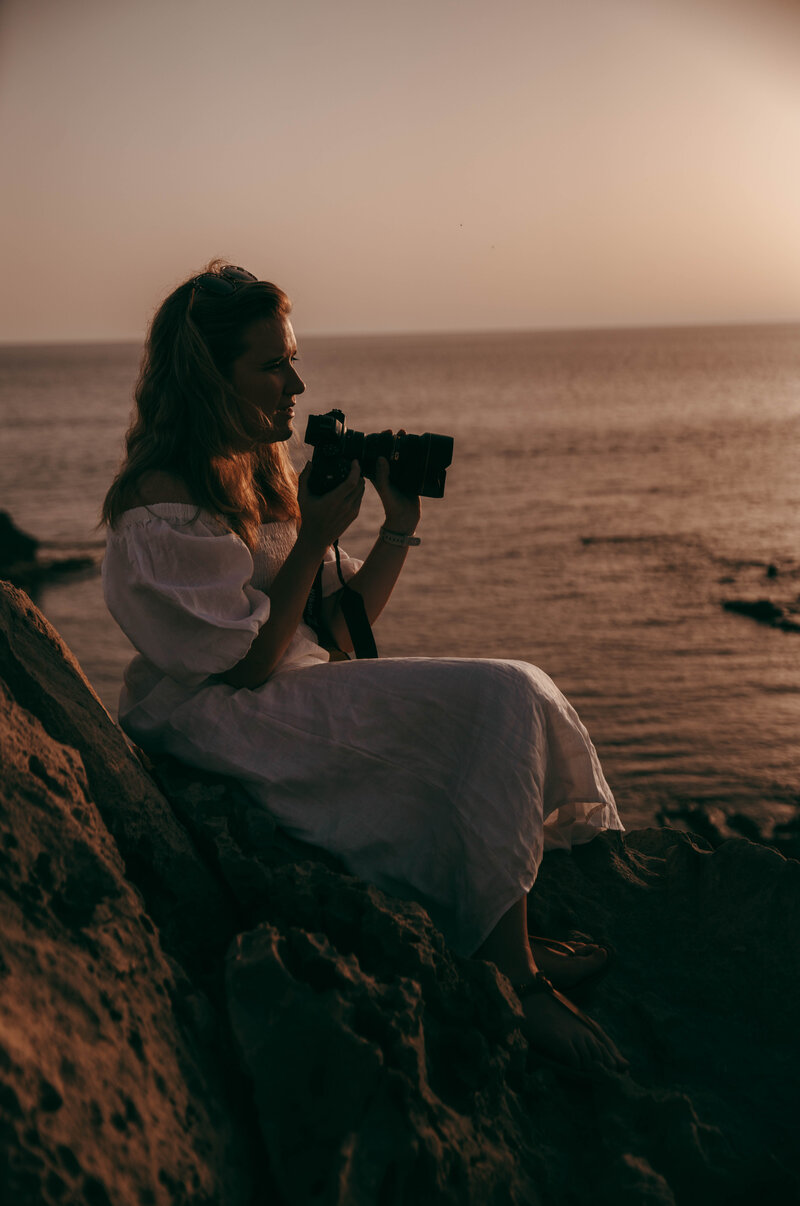Owner of Round Our World shooting a sunset
