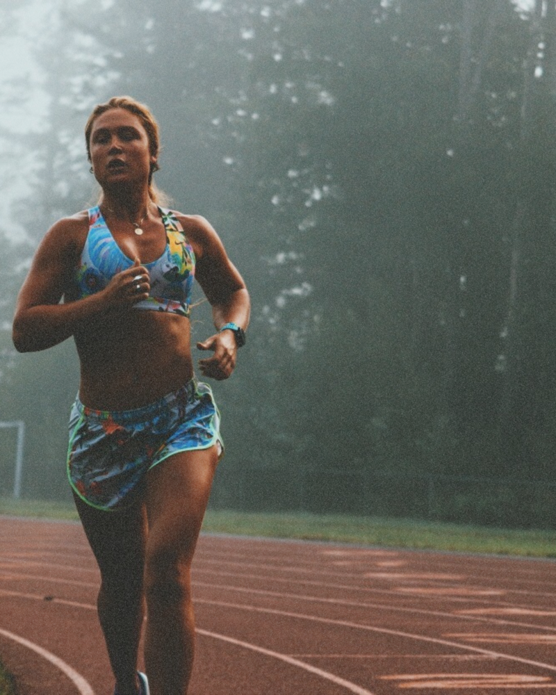 a female running on a track