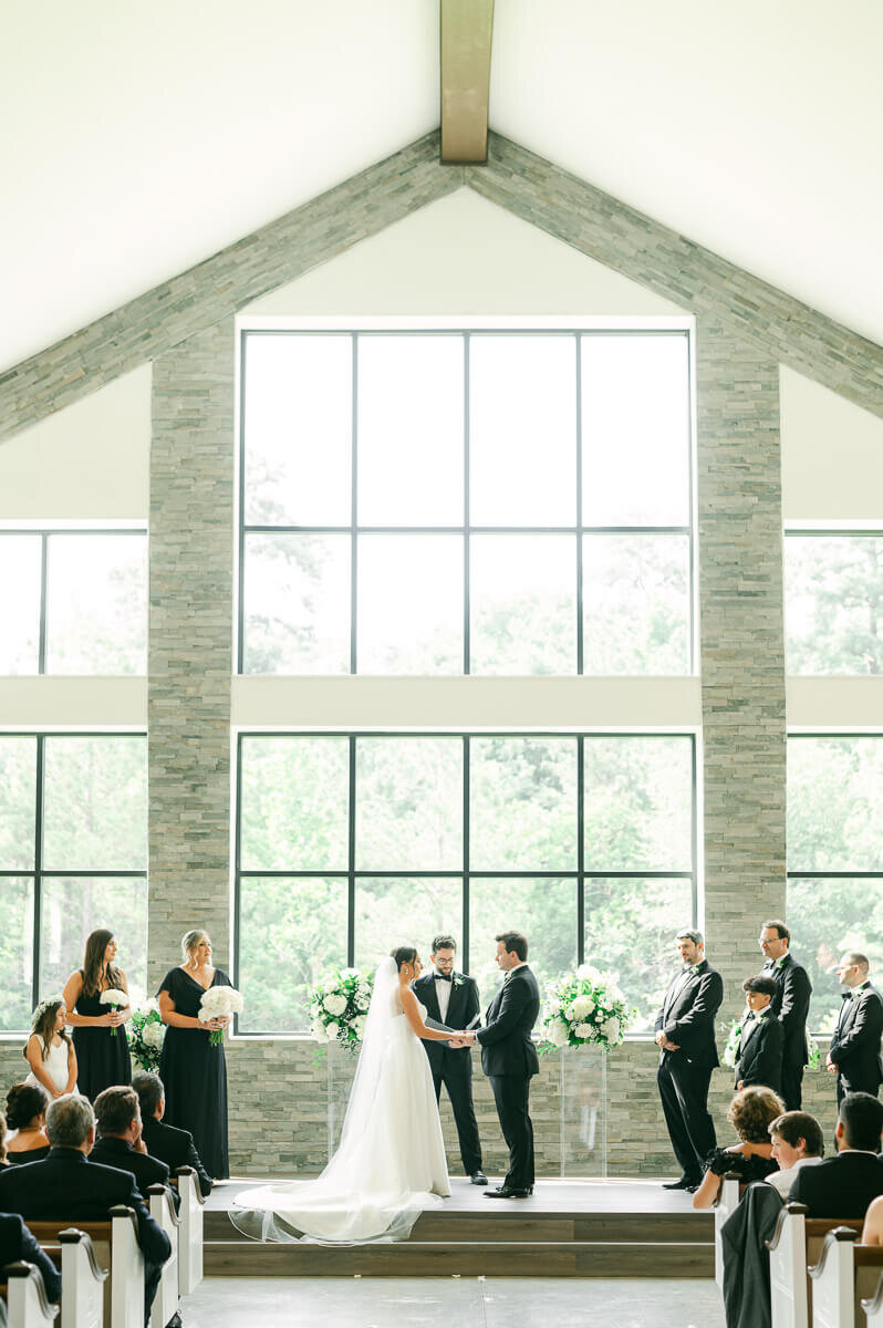 bride and groom during ceremony at grand pines reserve