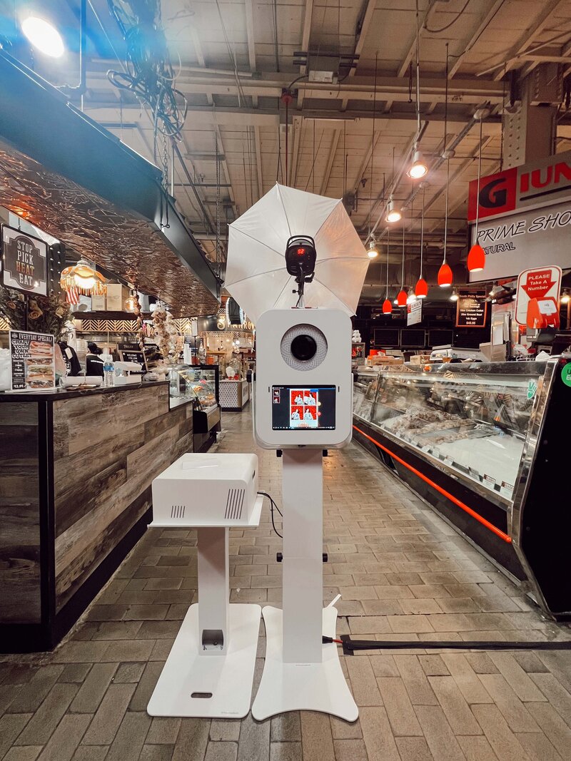 white modern photo booth setup nicely at the reading terminal market in philadelphia