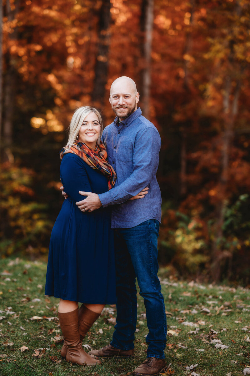 Couple embraces during Family Pictures in Charleston, South Carolina.