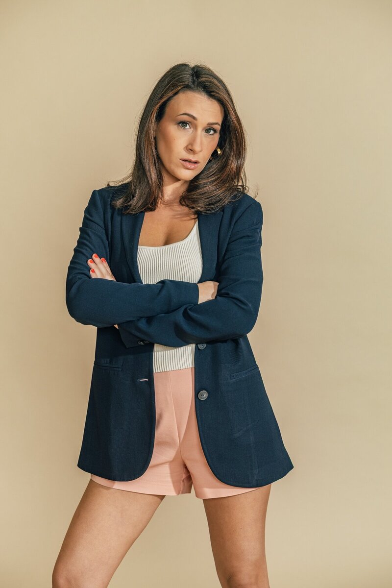 Julia Korn Blue Jacket Arms Crossed