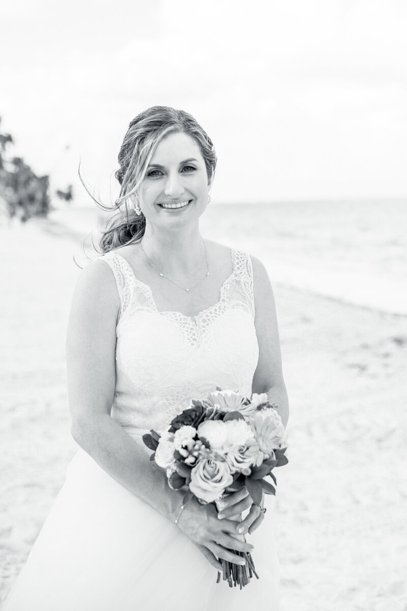 A black and white photo of designer, Shelley, who crafts custom and semi custom wedding invitations in Washington DC and beyond. 