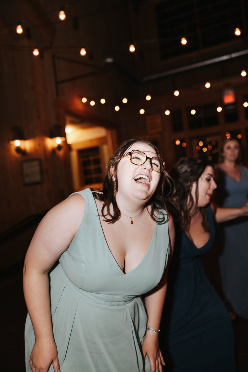 Owner Lilly Dancing at wedding