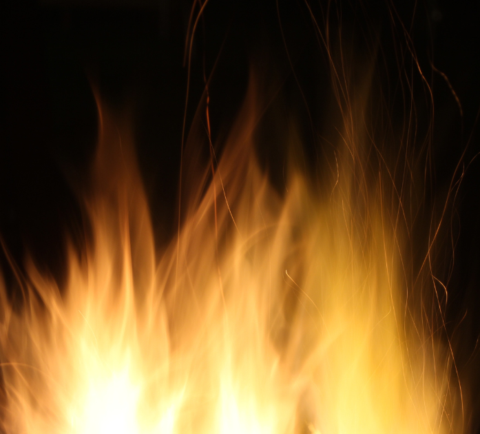 Fire background symbolizing the Burn Blend IV Vitamin Therapy, designed to support weight loss and metabolism at Refined Medical NY in East Setauket, Long Island.