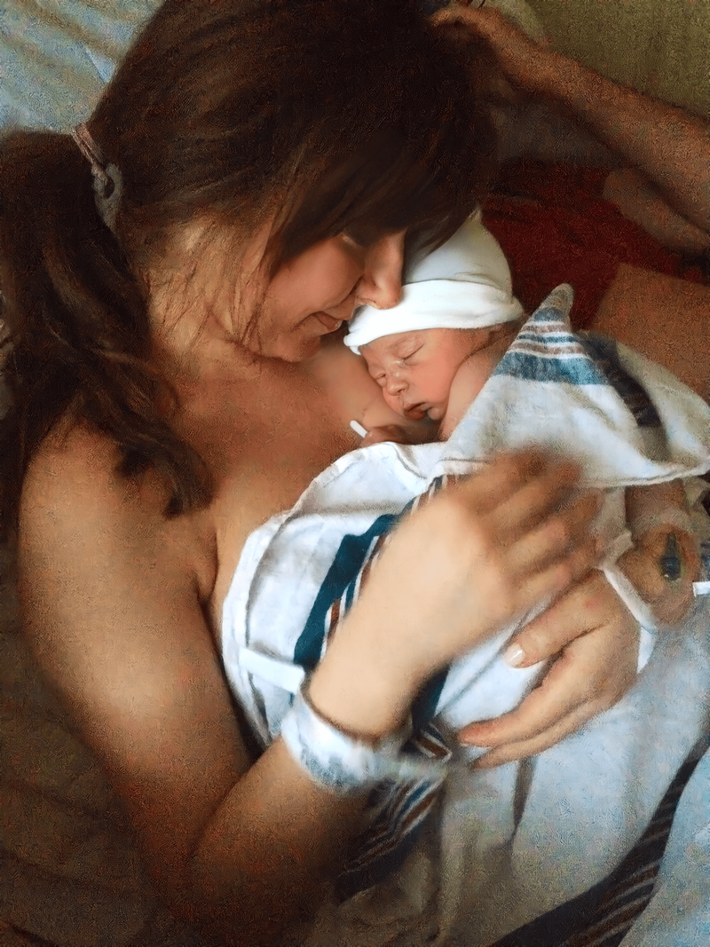 Ali and her son cuddle after birth