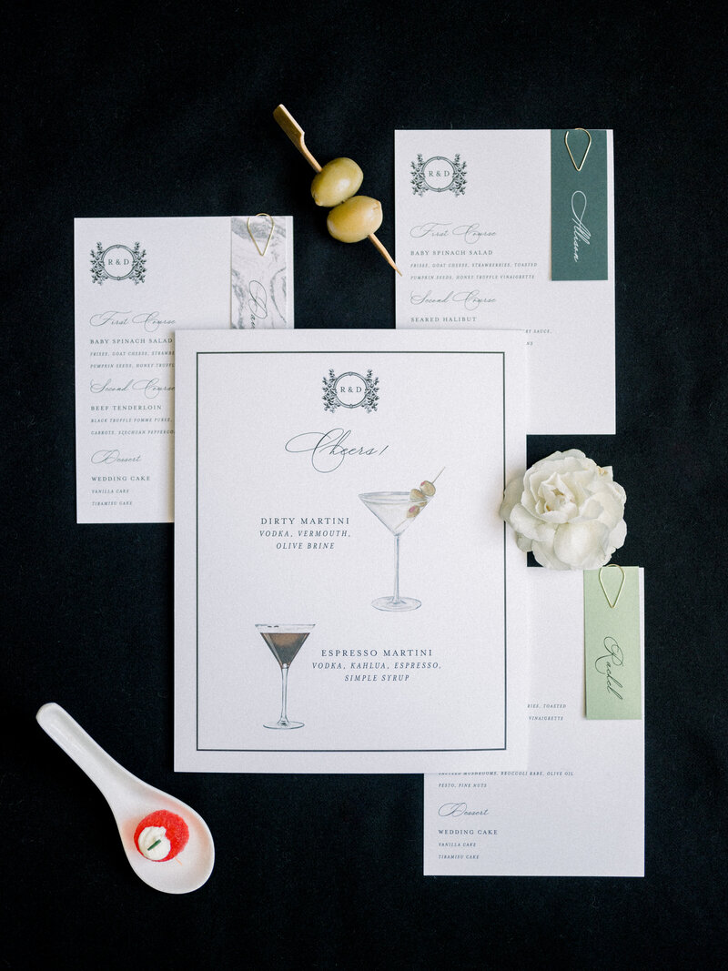 Reception Details laid out on a black background for Four Seasons wedding in Washington DC