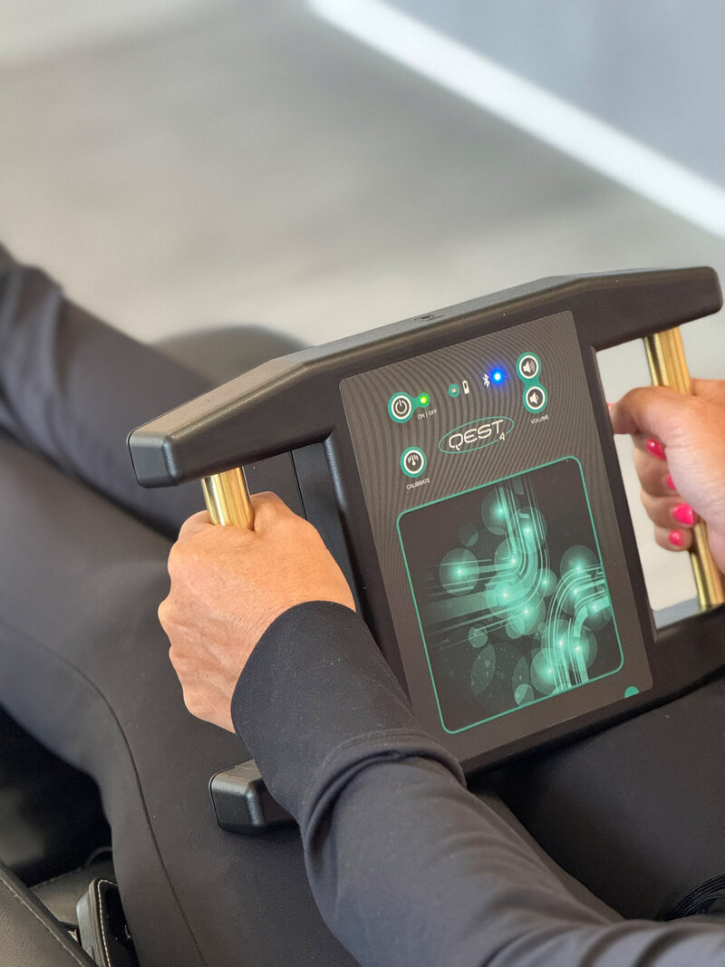 Woman standing on the vibration plate