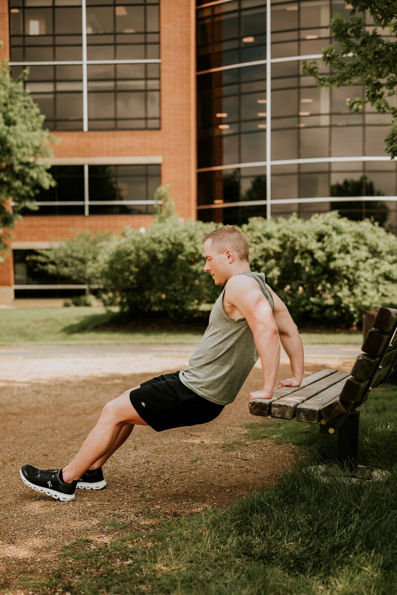 Man running on a scenic Minneapolis trail during a lifestyle dating photo session with a professional dating app photographer near me.