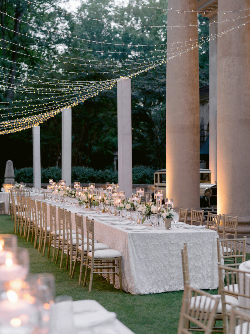 reception head table with string lights