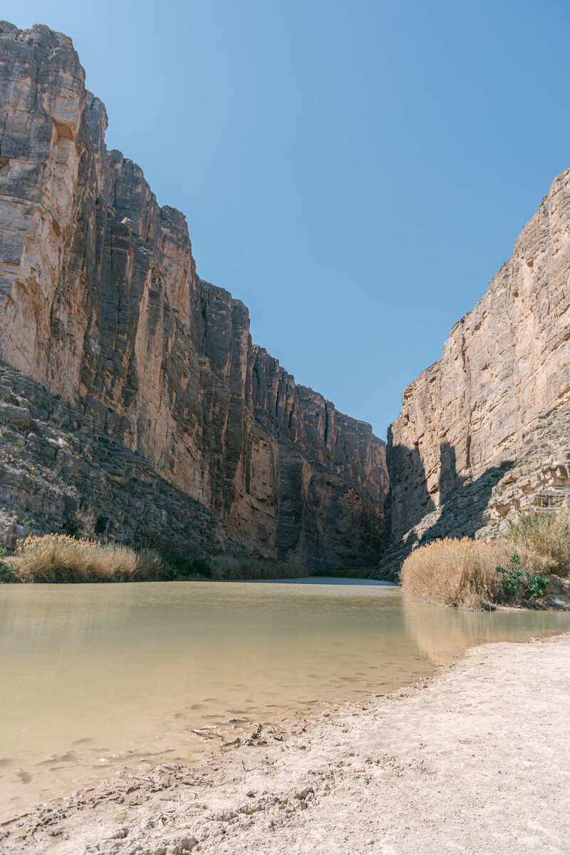 Wide-angle luxury editorial landscape photo of Santa Elena Canyon in Big Bend National Park, showcasing serene Texas views perfect for adventurous wedding backdrops.
