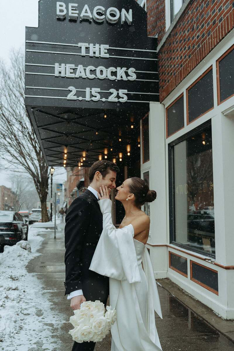 bride and groom outside of their winter wedding shot by elsie goodman photography