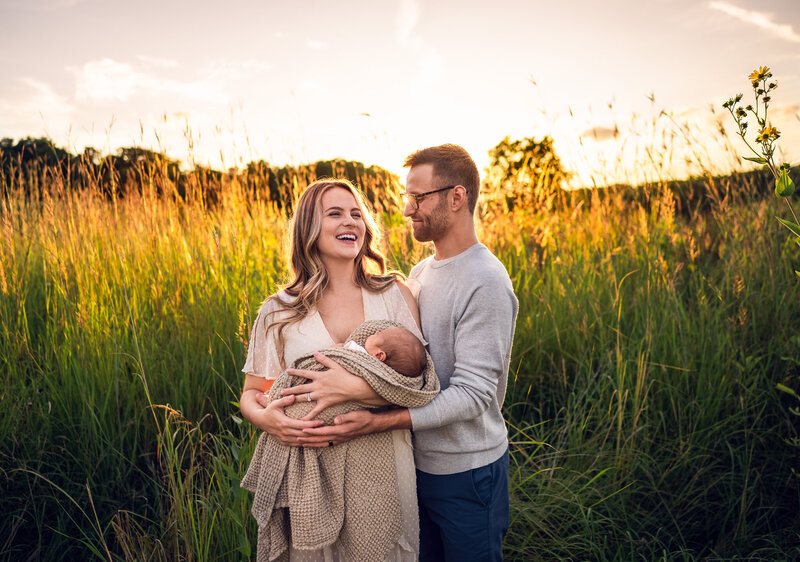 Family photo session outside with newborn