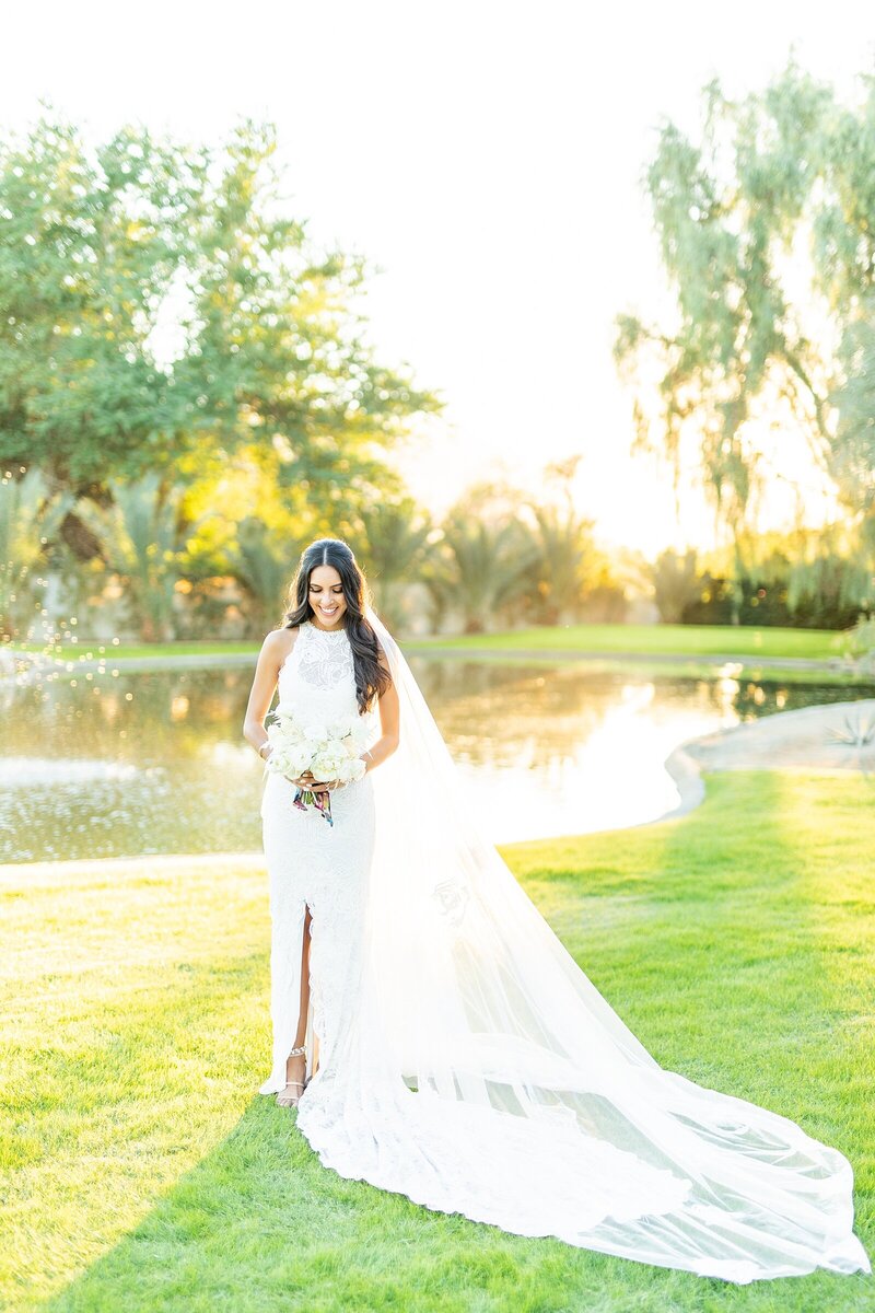 Bride in Grace Loves Lace wedding gown at The Old Polo Estate in Coachella, California.