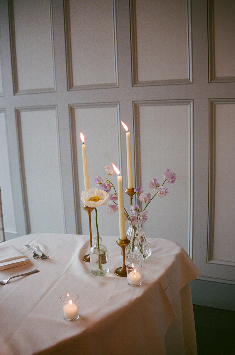 table settings with candle light styled by Yours Truly, a wedding planner and designer in New Jersey.