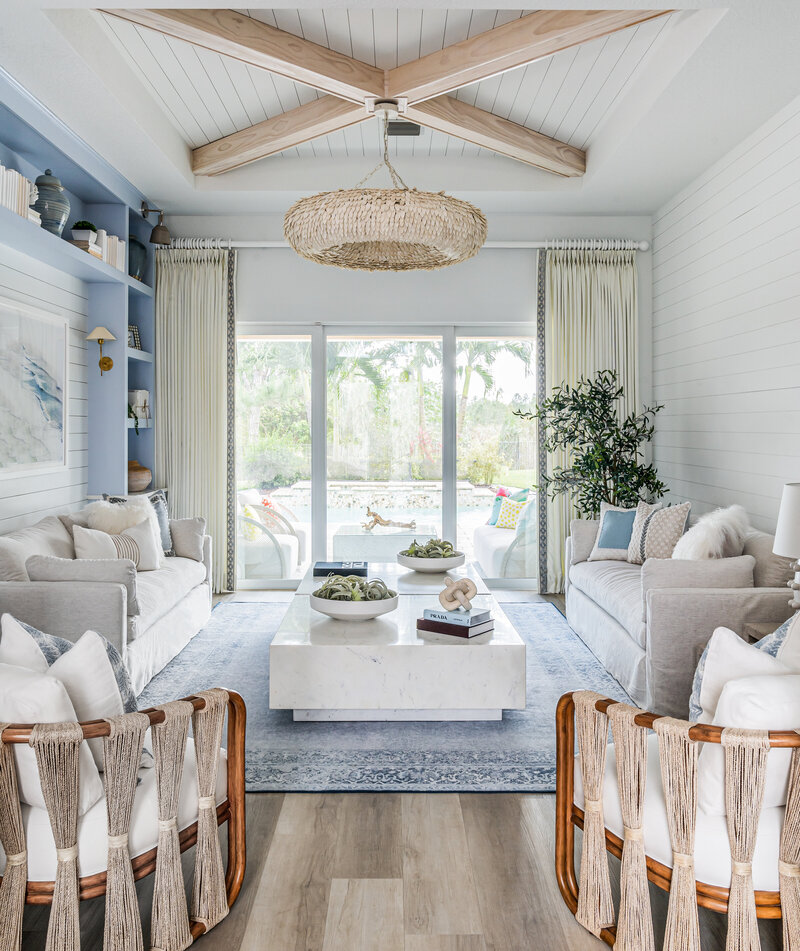 coastal luxury home formal living room full service interior design by Island Home Interiors Lake Nona