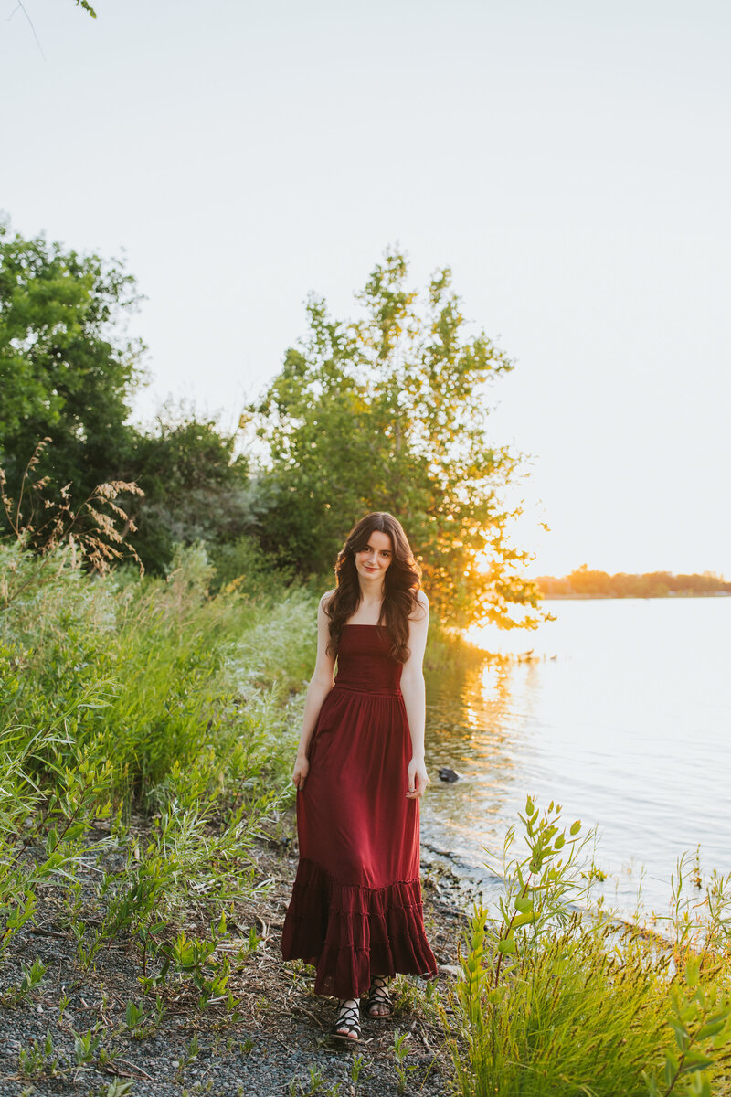 Senior portrait in flower field by Tri Cities WA photographer