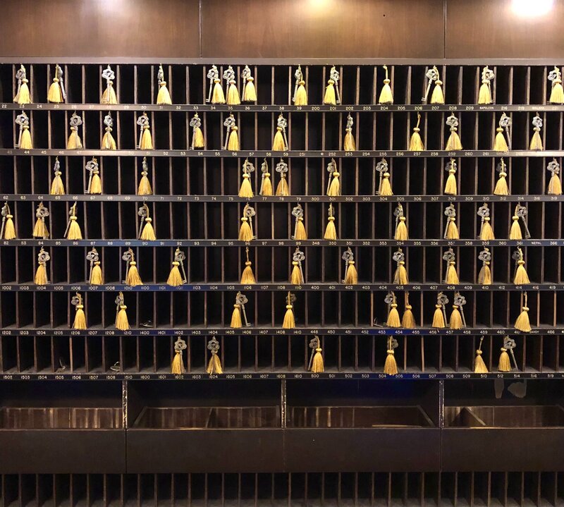 wall of keys at a boutique hotel